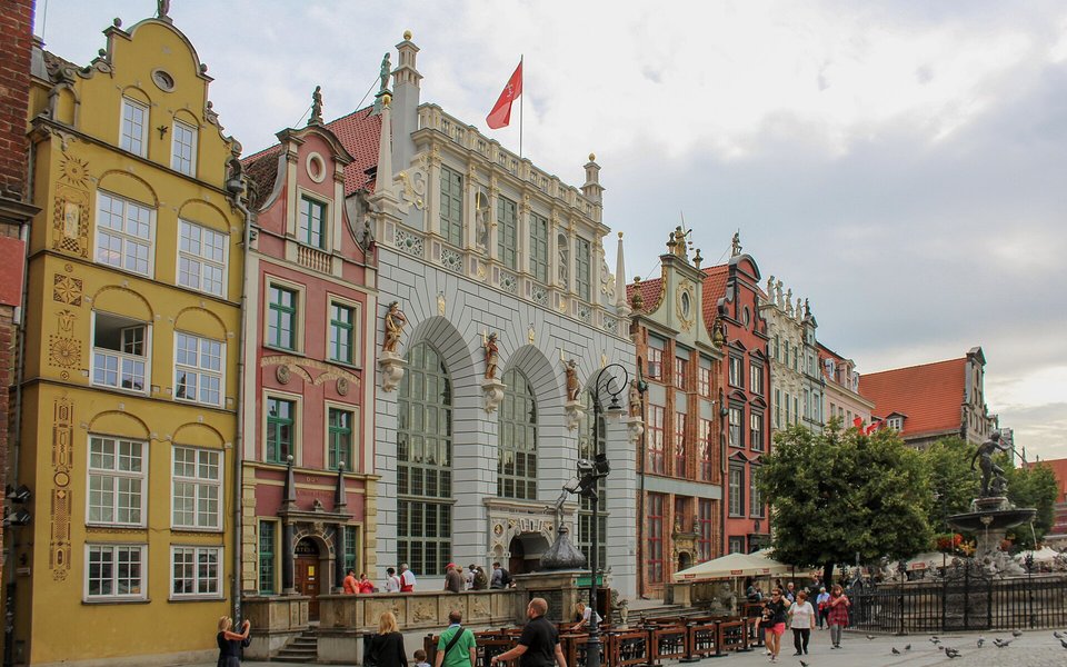 Colorful historic buildings and Artus Court in the Long Market square of Gdańsk, Poland