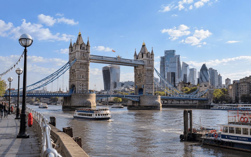Tower Bridge on the River Thames with the City of London skyline behind it