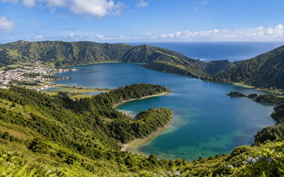 Sete Cidades crater lakes on São Miguel in the Azores, Portugal, with green hills and the Atlantic beyond