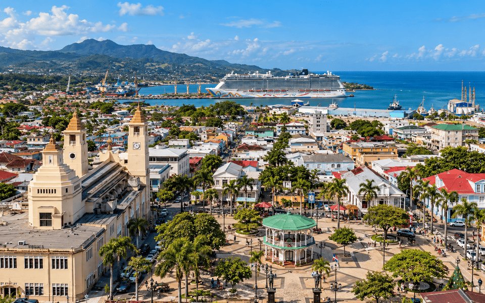 Aerial view of Puerto Plata with Independence Park, San Felipe Cathedral and a cruise ship in the harbor